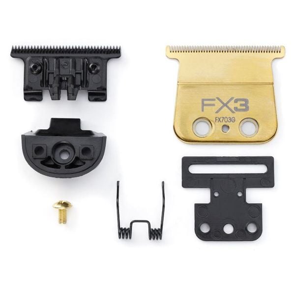 BaBylissPRO FX703G gold FX3 trimmer blade set with cutter, housing and hardware on a white background